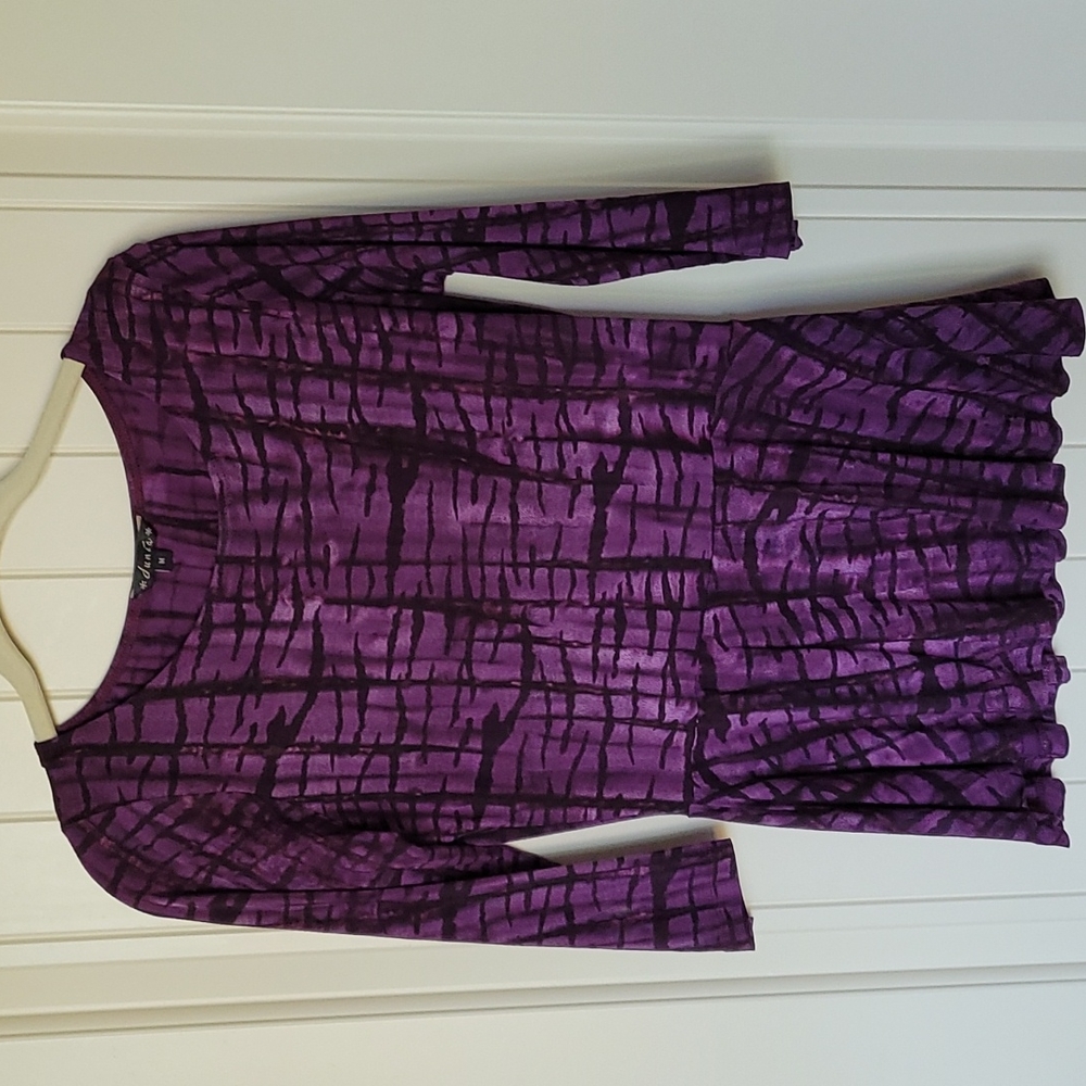 Dunía knit peplum top